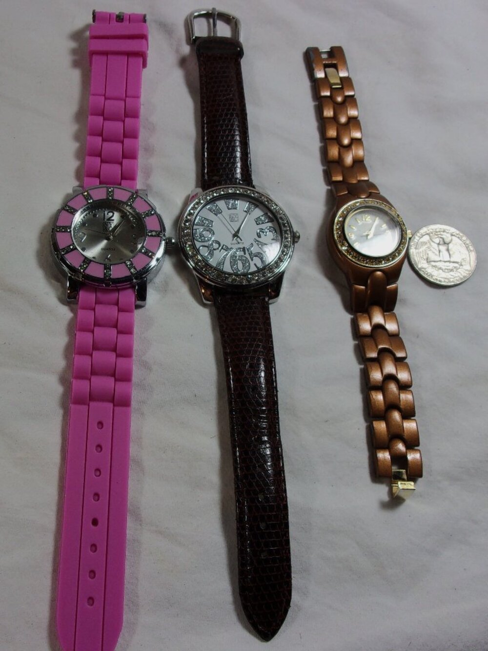 LOT OF THREE NY & C WOMEN'S WATCHES-PINK-BROWN-ALL RUN AND KEEP GOOD TIME